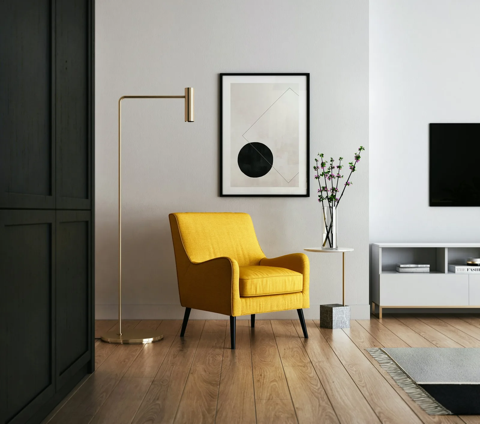 Bright living room with timber floors, a mustard chair, and simple black-and-white artwork